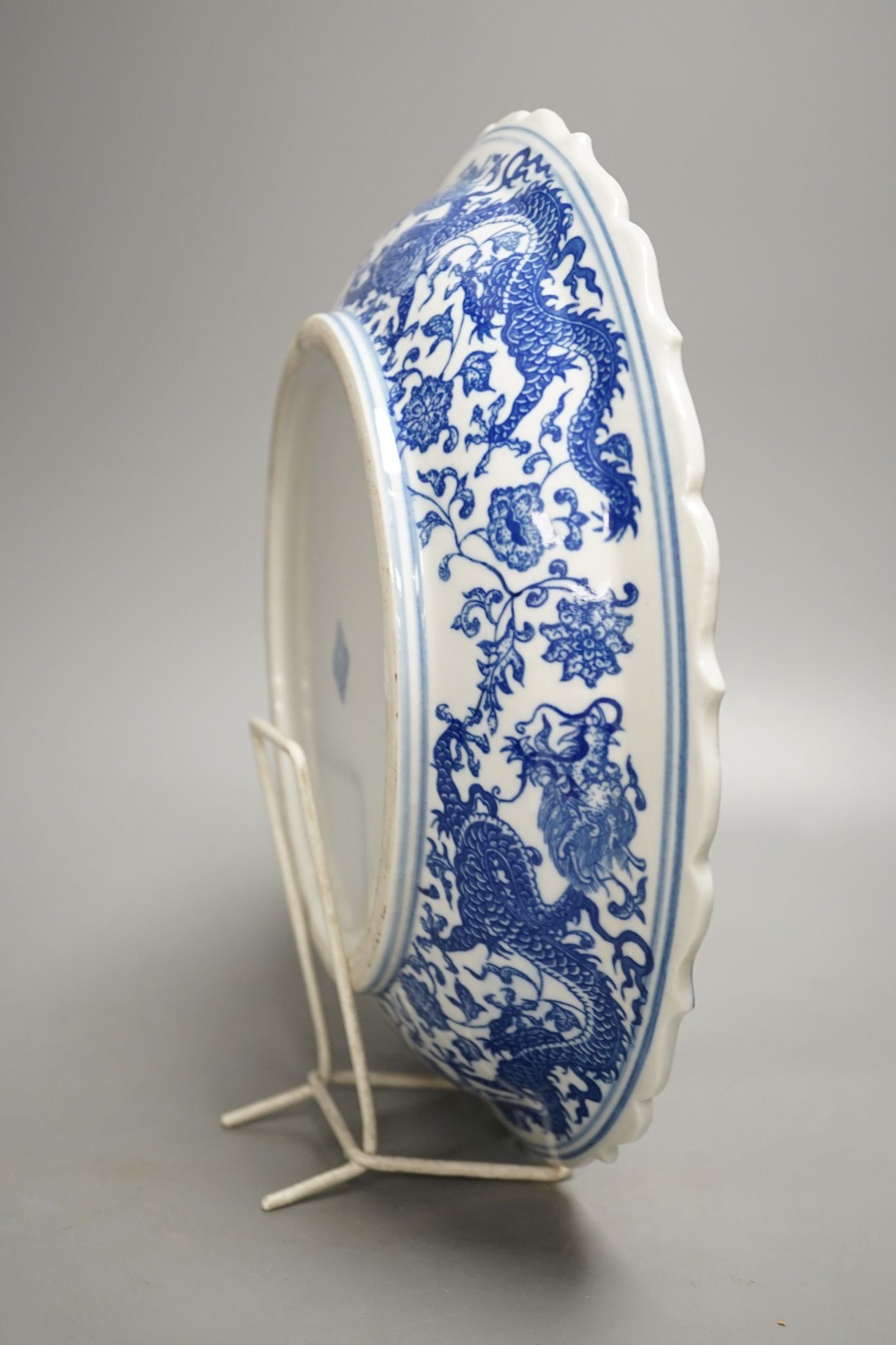 A Chinese blue and white ‘dragon’ dish 31cm